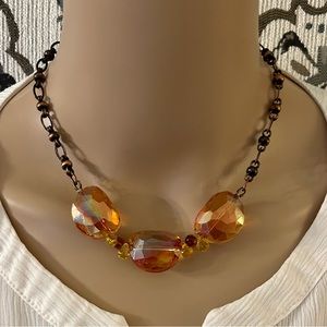 Unique handmade necklace on copper chain with iridescent orange glass beads, 17”
